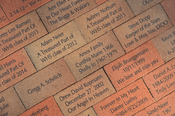 remembered loved ones with a engraved brick memorial